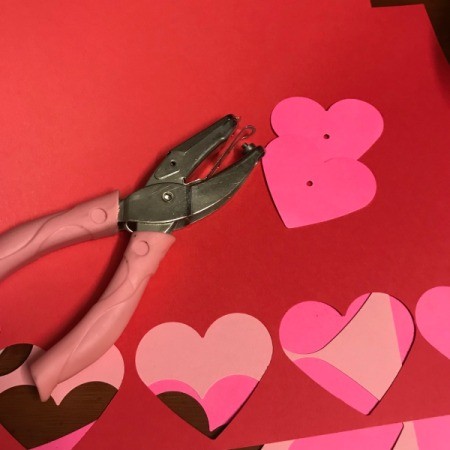 Heart Shaped Leis - holes punched in the center of the hearts