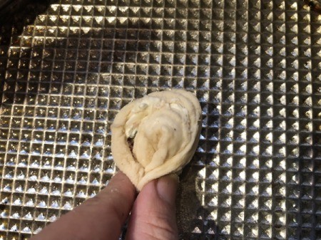 pinched dough circle on pan