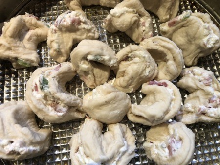 pinched dough circles on pan