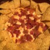 Baked Three Cheese Bacon Dip surrounded by chips