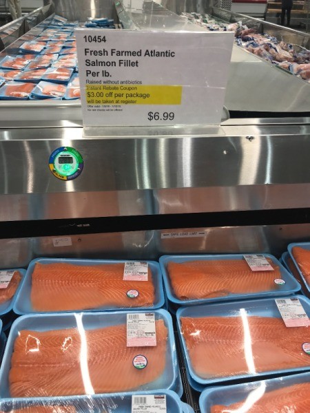 Packages of salmon at Costco, marked down.