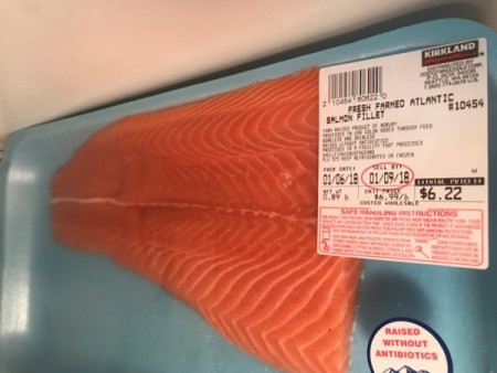 A package of salmon from Costco, marked down.