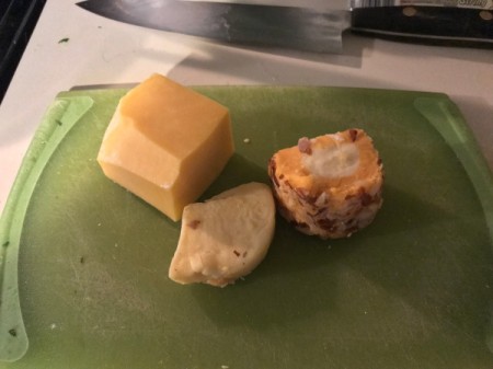 Three different leftover cheese.