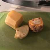 Three different leftover cheese.