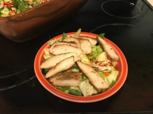 A bowl of Vietnamese Salad in a bowl with grilled chicken.