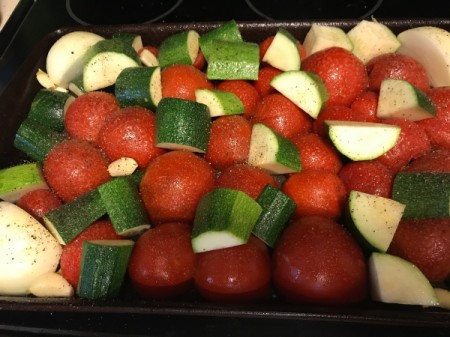 Vegetables ready for roasting for tomato soup.