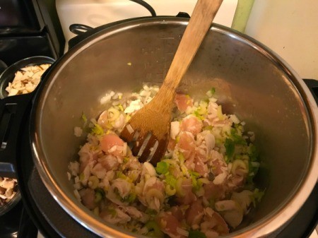 A pot of soup ingredients before being pressure cooked.