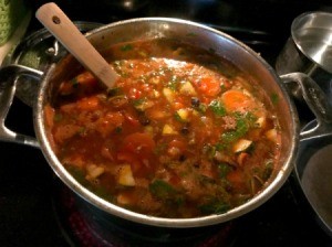 A pot of taco soup cooking on the stove.