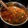A pot of taco soup cooking on the stove.