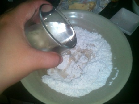 adding water to flour mixture