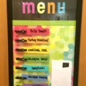 a colorful menu board, showing a week's worth of dinner plans.