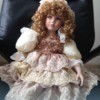 Finding the Value of a Porcelain Doll - doll in lacy dress