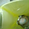 A hole poked at the top of the trash bag to avoid an air pocket.