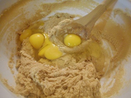 mixing eggs with butter and eggs
