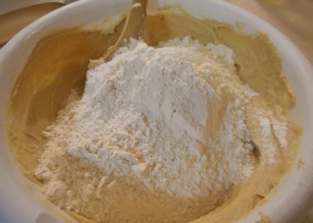 adding flour to butter mixture