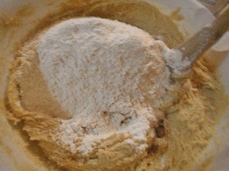 adding flour to butter mixture