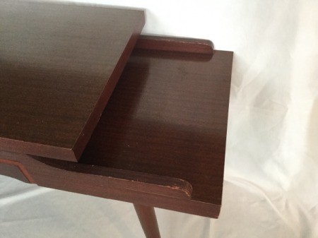 A vintage side table.