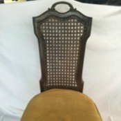 Identifying a Cane Back Chair - dark wood chair with upholstered seat and narrow cane back