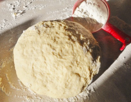 kneading flour into dough