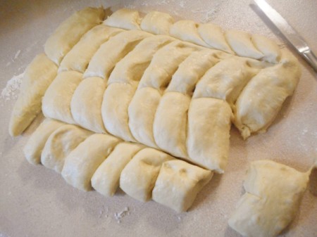 cut rolls from flattened dough