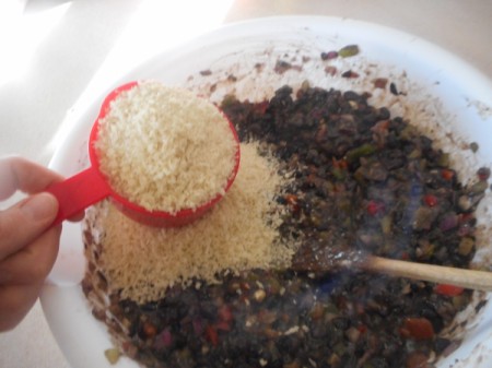 adding bread crumbs to smashed beans