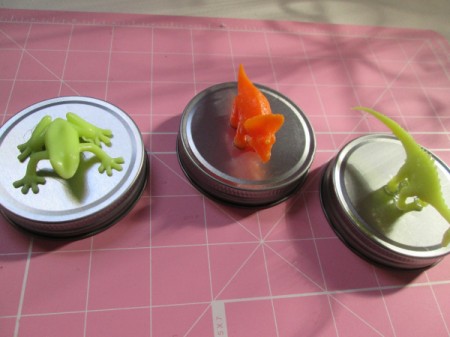 Glass Jar Party Favors - three plastic animals glued to three lids