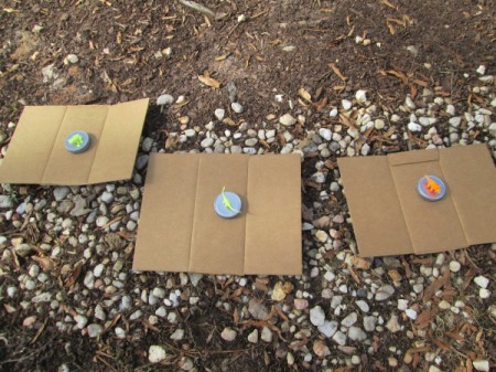 Glass Jar Party Favors - lids separated onto pieces of cardboard