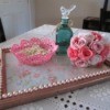 A decorative tray made from a wooden picture frame.
