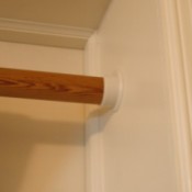 Closet Rod for Hanging Blanket In Doorway - wooden rod in holder