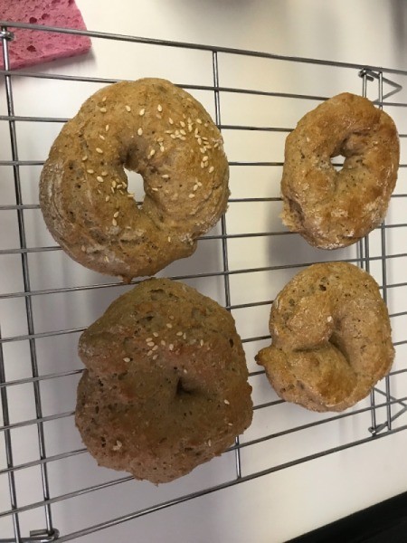 Bagels cooling on rack.