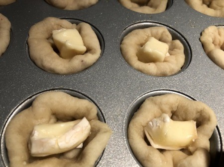 added brie to dough in muffin tins