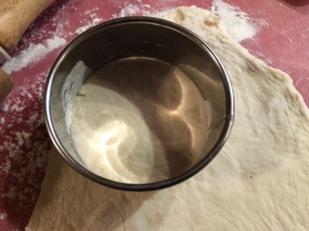 cup of flour with dough