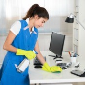 Woman Cleaning Office