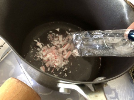 Peppermint Syrup as a Valentine's Gift - add crushed candy to a pan with the water