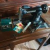 Manual for a Precision Deluxe Sewing Machine - vintage sewing machine in cabient