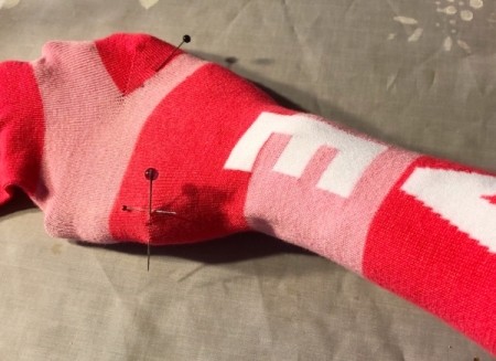 DIY Arm Warmers from Socks - place the sock over your arm and pin where your thumb would come out and at the heel, your knuckles should be near the heel