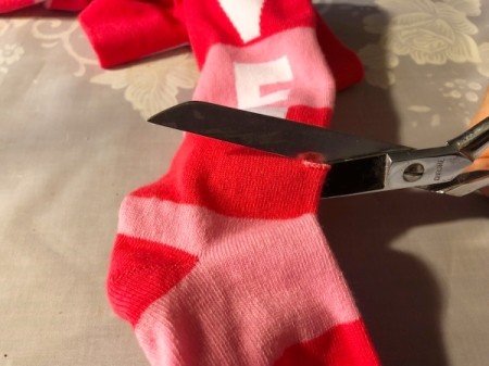 DIY Arm Warmers from Socks - cut a small straight hole for your thumb