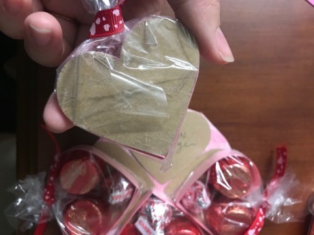 Valentine's Heart Chocolate Candy/Coupon Gift - tape the individual bags of boxed candy down over the coupons