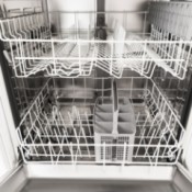 An empty dishwasher with the door open.
