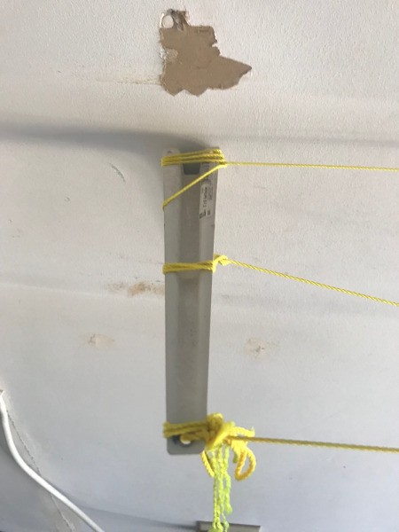Laundry Drying Line in the Garage - bracket with rope for lines added