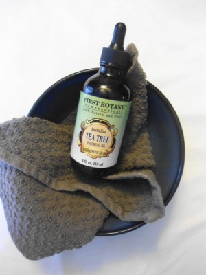Tea Tree Oil in Bowl With Cloth