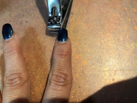 Trimming and Upkeep of Acrylic Nails - clip to the center from the other side