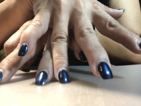 Trimming and Upkeep of Acrylic Nails - compare nails on both hands to make sure they are even
