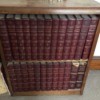 Value of 1768 Britannica Encyclopedia Set - volumes on bookcase shelves