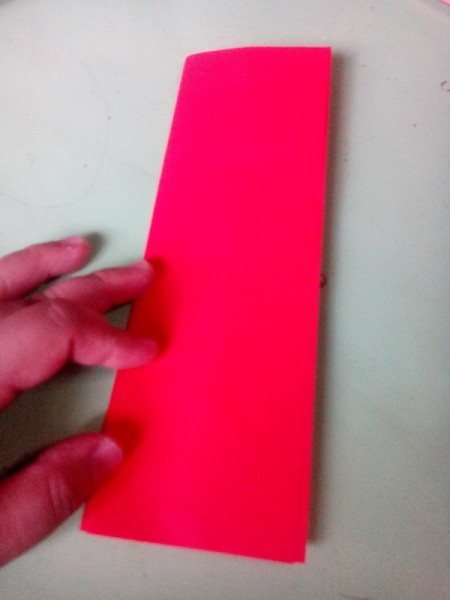 Pop Heart Decoration - fold a piece of red paper twice