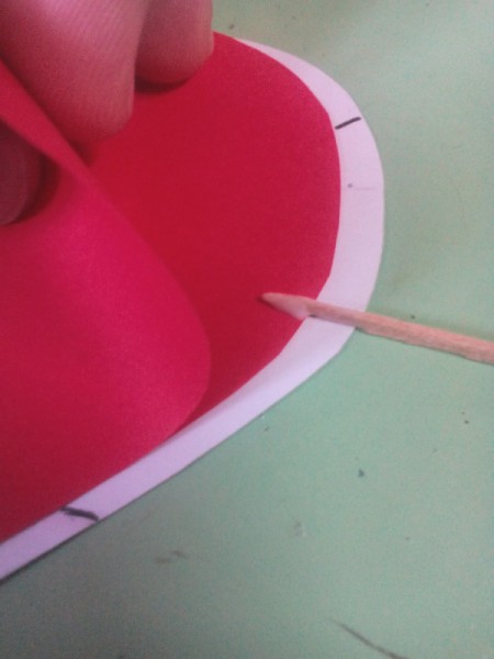 Pop Heart Decoration - use a toothpick to put a spot of glue inside the folded red heart at each mark