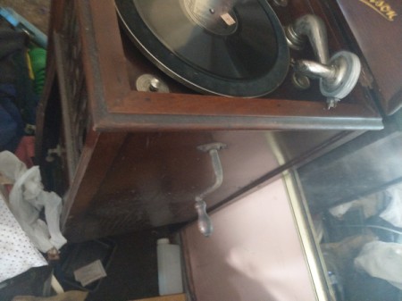 Value of a Denison Record Player - side view with crank visible