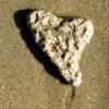 Heart-Shaped Stone - stone on a sandy beach