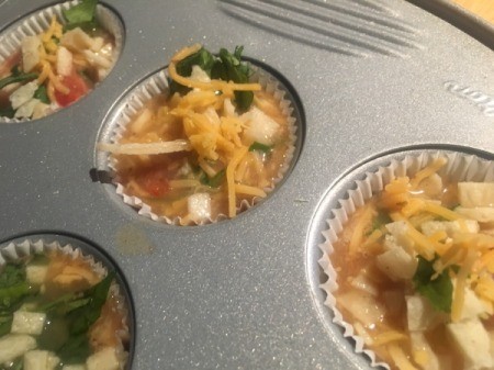 cheese added to baking tins