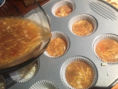pouring egg mix into tins